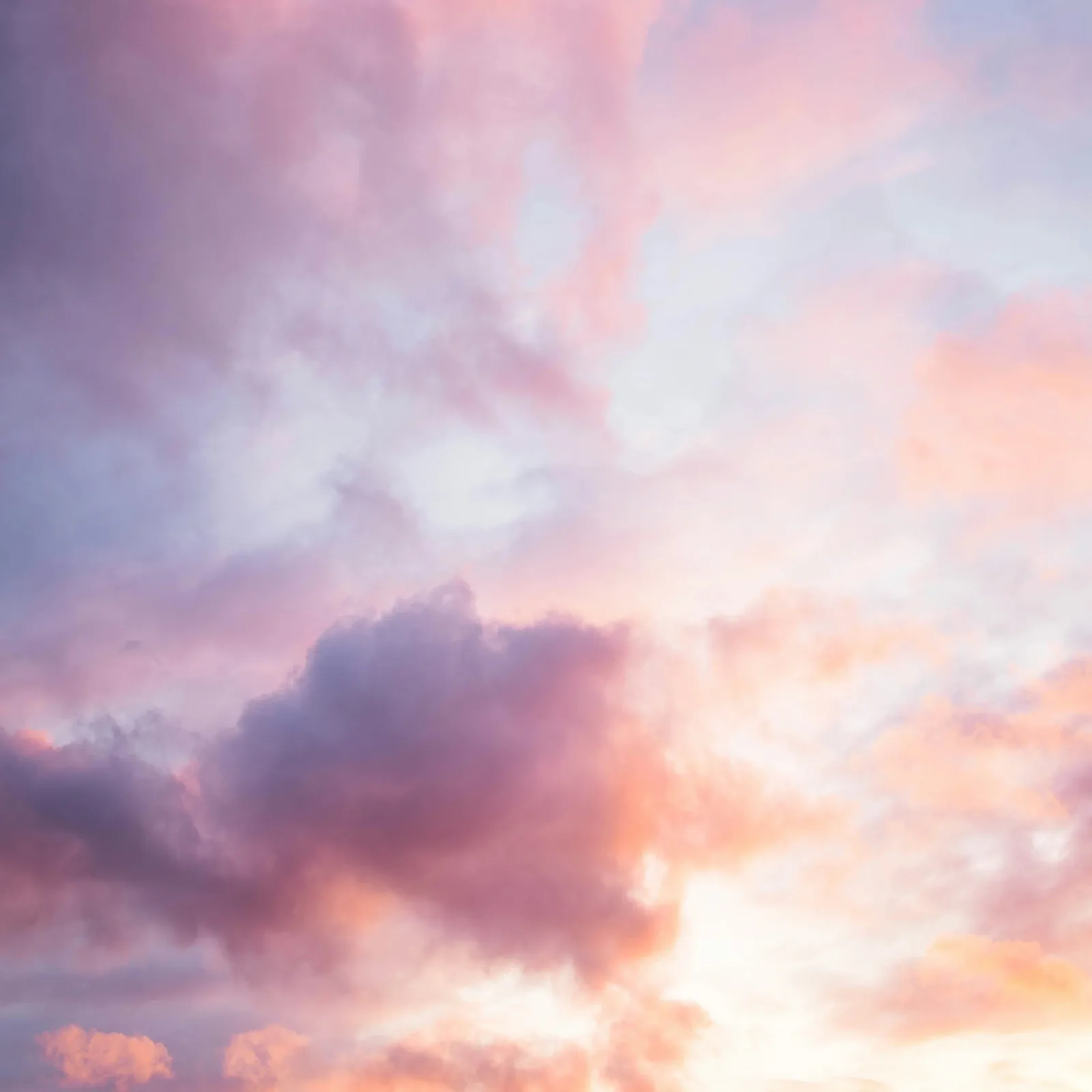 Soft pink and lilac clouds at sunset